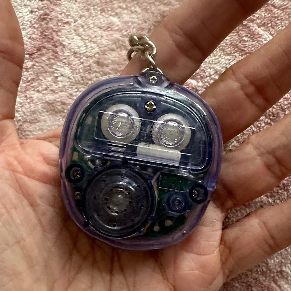 1997 Microchimp Purple Giga Pets Digital Keychain